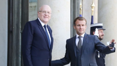 "ماكرون" يستقبل "ميقاتي" ويتعهد بمعاقبة المسؤولين عن تأخير تشكيل الحكومة