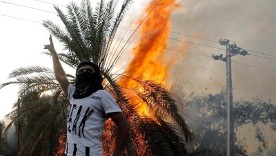 المظاهرات تعم العراق وقوات الأمن تقتل مدنيا وتصيب العشرات