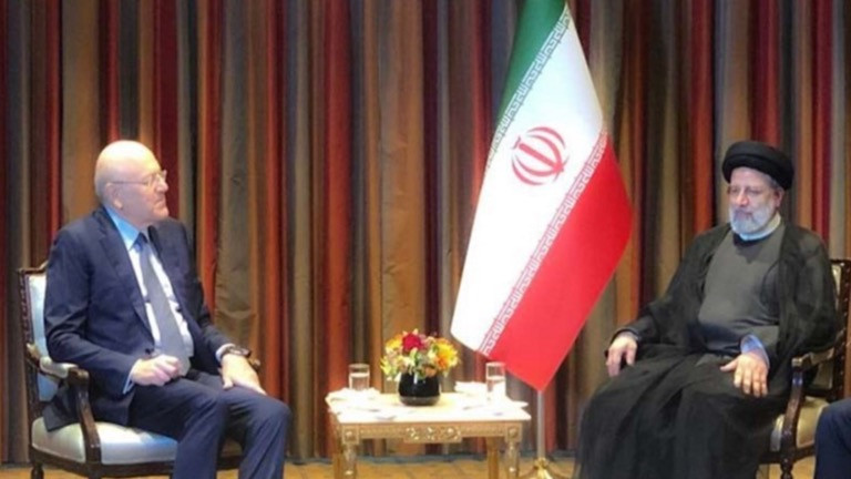 علم لبنان يغيب عن لقاء "ميقاتي" ورئيسي" و"الخارجية" تبرر