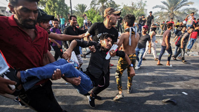 قناصة إيران بالعراق.. قتل باتجاهين لحرف مسار المظاهرات