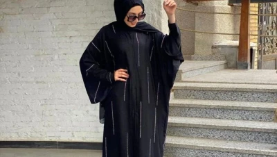 تفسير حلم لبس العباءة في المنام